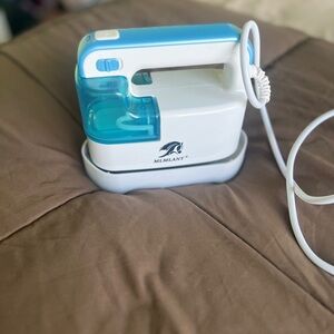 Blue and White Handheld Steamer